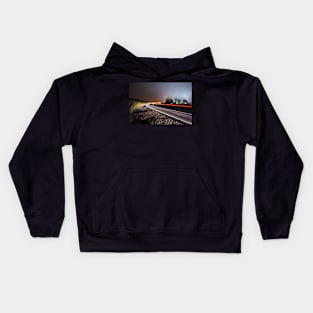 Foggy night on Ilkley Moor light trails on the road Kids Hoodie